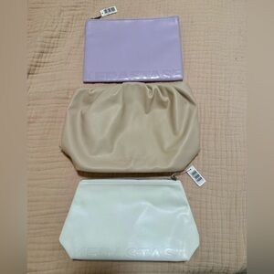 Moroccanoil & 2 Kerastase cosmetics bags